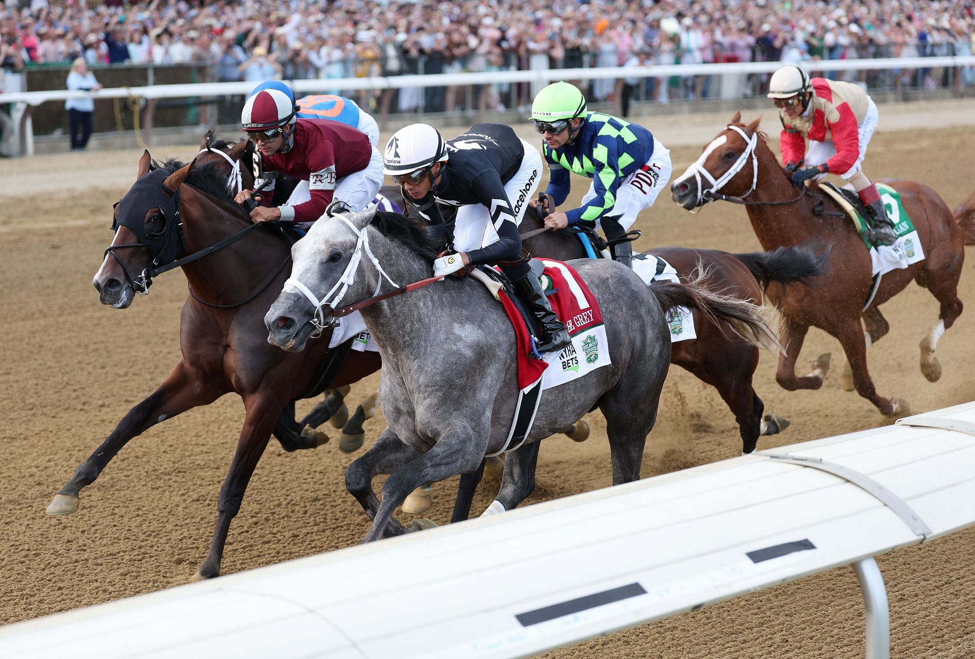 Horses competing during the 2024 Belmont Stakes event (Image via: Getty)